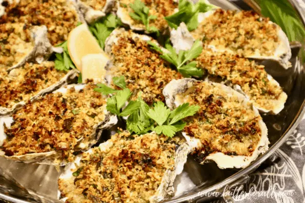 https://www.butterforall.com/wp-content/uploads/2021/08/Oysters-Rockefeller-Topped-With-Buttery-Toasted-Sourdough-Breadcrumbs-595x397.png.webp
