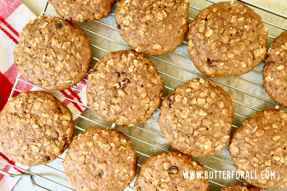 Einkorn sourdough oatmeal raisin cookies cooling on a baking rack.