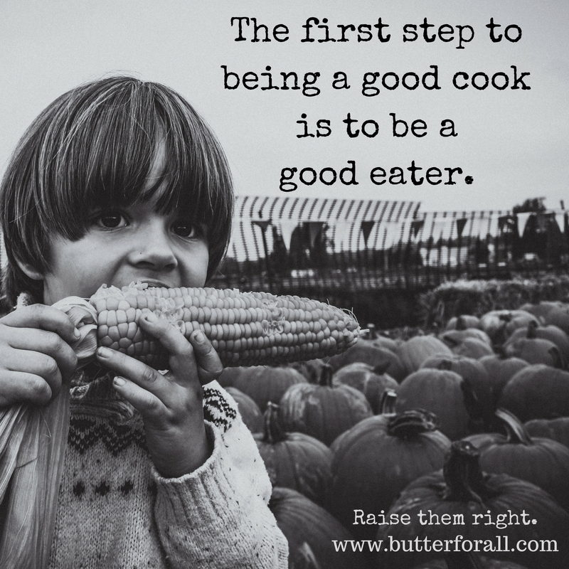 Child eating corn on the cob in a farm scene.